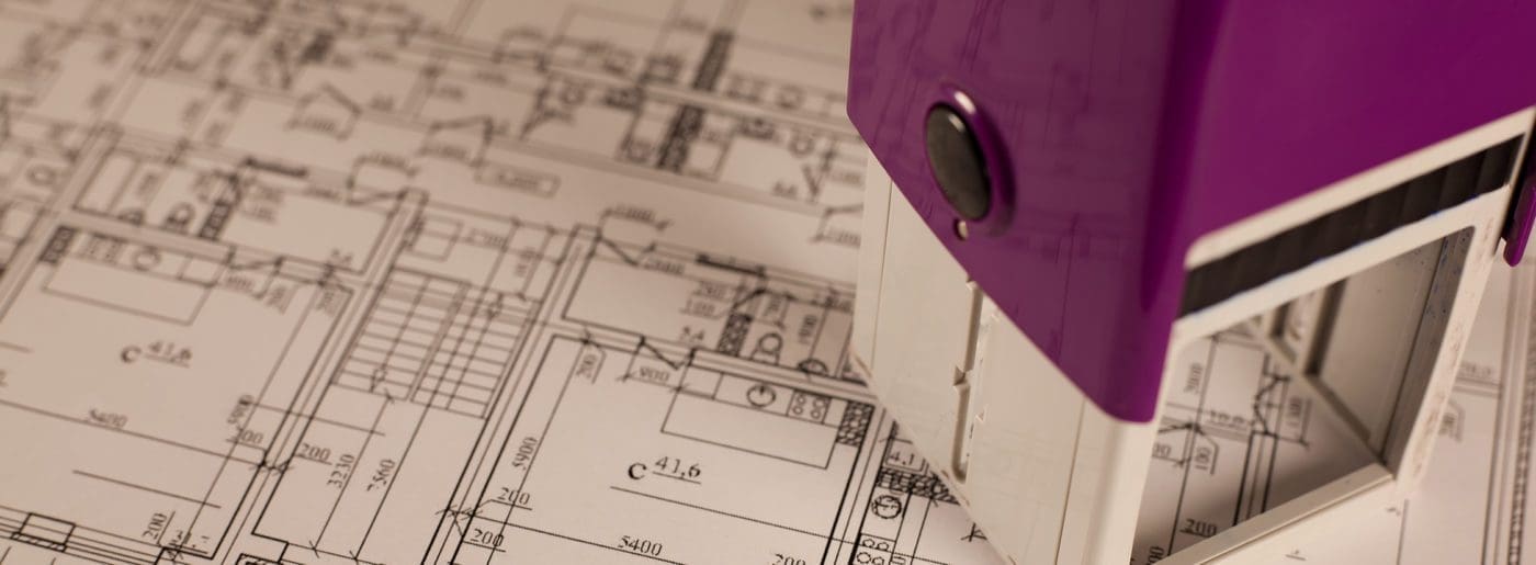 Stamp on plan of house background.